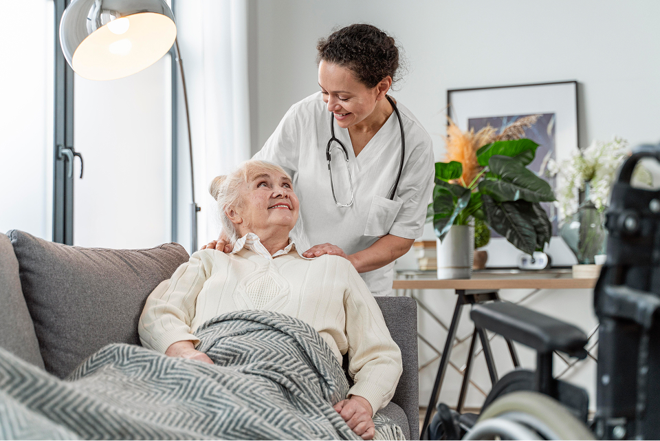 Caregiver assisting a client at home